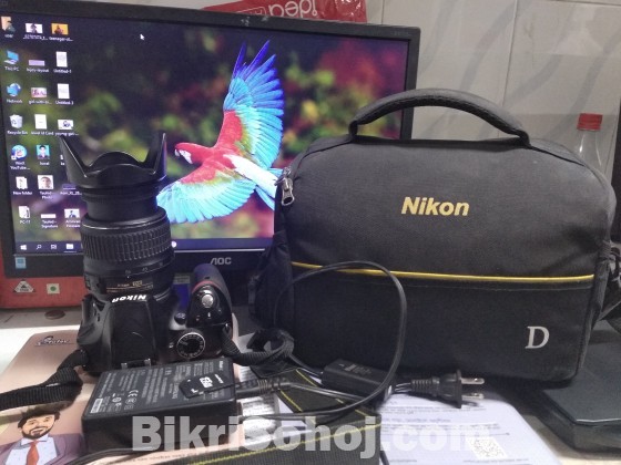 Nikon D3200 with lens (18-55)